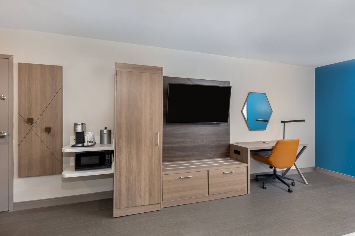 premium bedding, desk, laptop workspace, iron/ironing board