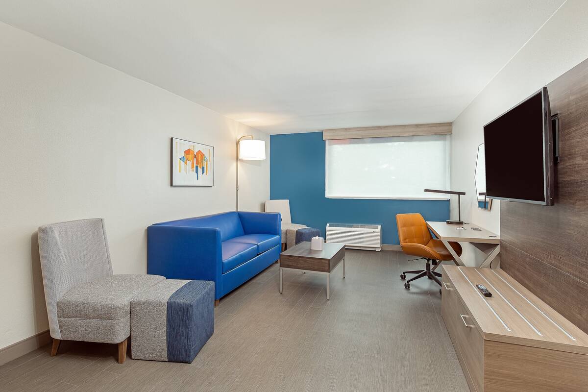 premium bedding, desk, laptop workspace, iron/ironing board