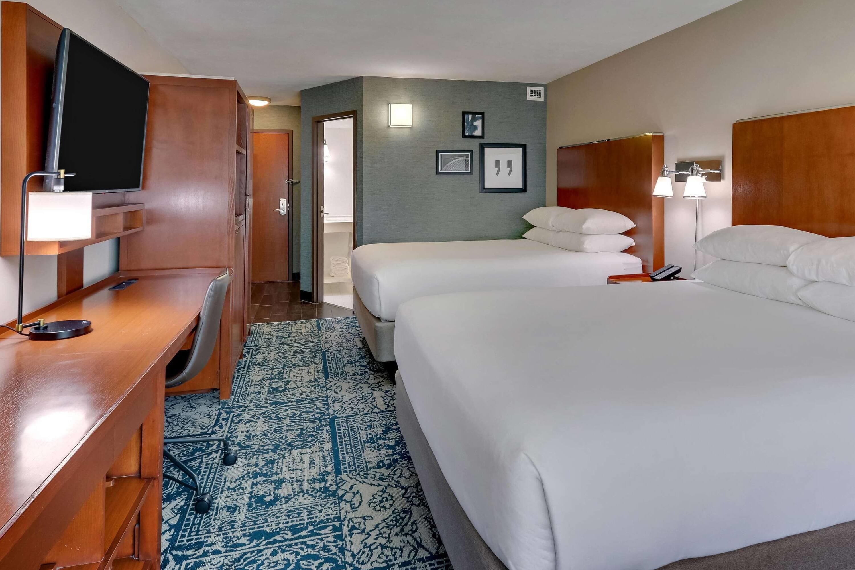 Deluxe Room, 2 Queen Beds, Accessible, Non Smoking | Desk, laptop workspace, blackout drapes, iron/ironing board