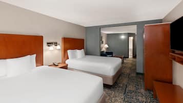 Suite, 2 Queen Beds, Non Smoking | Desk, laptop workspace, blackout drapes, iron/ironing board