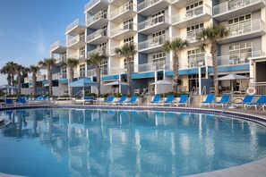 Outdoor pool, open 9:00 AM to 10:00 PM, cabanas (surcharge)