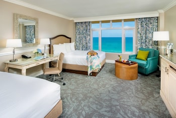 Room, 2 Queen Beds, Oceanfront | Premium bedding, pillowtop beds, in-room safe, individually decorated at The Shores Resort & Spa