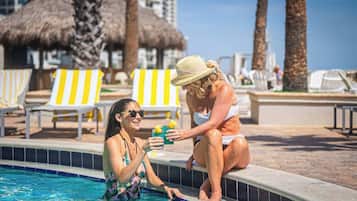 Outdoor pool, open 9:00 AM to 10:00 PM, pool cabanas (surcharge)