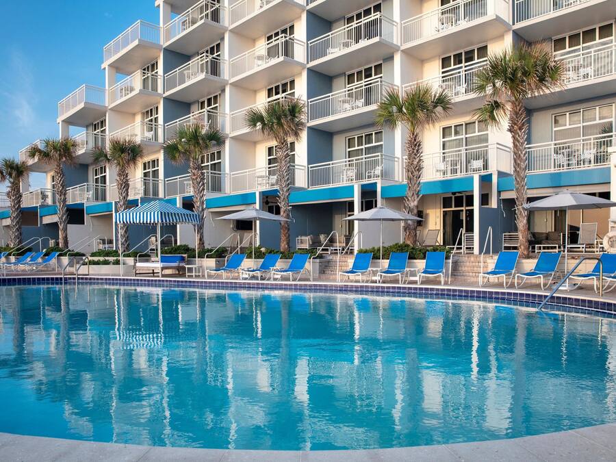 Outdoor pool, open 9:00 AM to 10:00 PM, cabanas (surcharge)