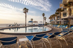 Outdoor pool, open 9:00 AM to 10:00 PM, cabanas (surcharge)