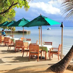 Breakfast, lunch, dinner served; beach views