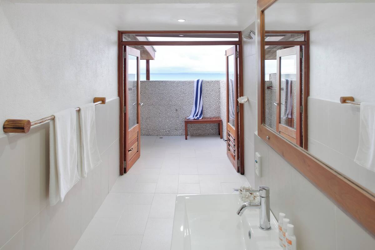 premium bungalow, ocean view, beachfront | bathroom | shower, free toiletries, hair dryer, towels