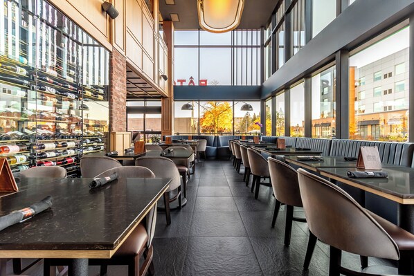Enjoy a professional and inviting space with a variety of seating areas and large windows offering a view.