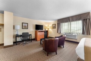 Suite, 1 King Bed, Non Smoking, Refrigerator & Microwave | In-room safe, laptop workspace, iron/ironing board, WiFi