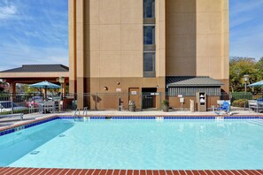 Seasonal outdoor pool, open 8 AM to 10 PM, pool loungers