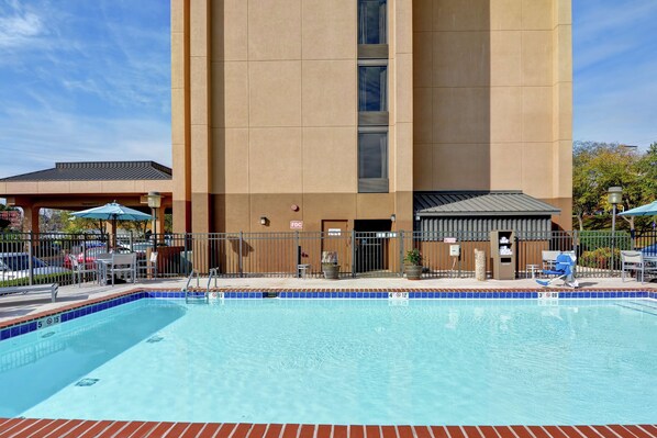 Seasonal outdoor pool, pool loungers