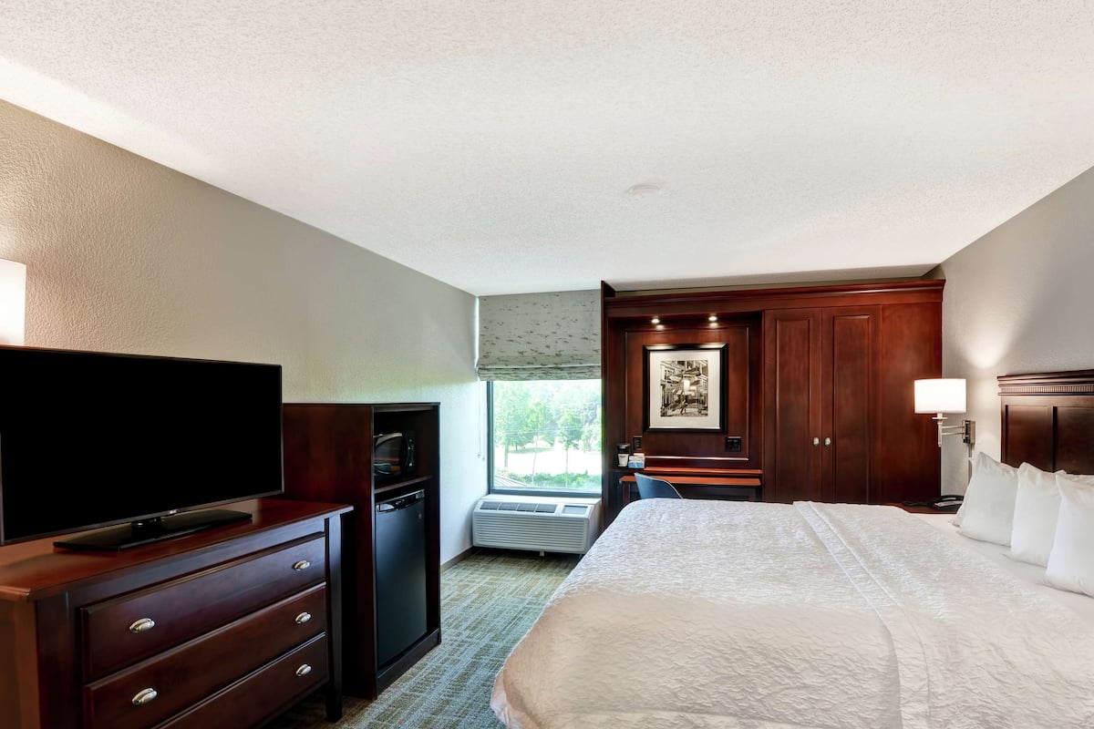 Premium bedding, pillow-top beds, laptop workspace, blackout curtains