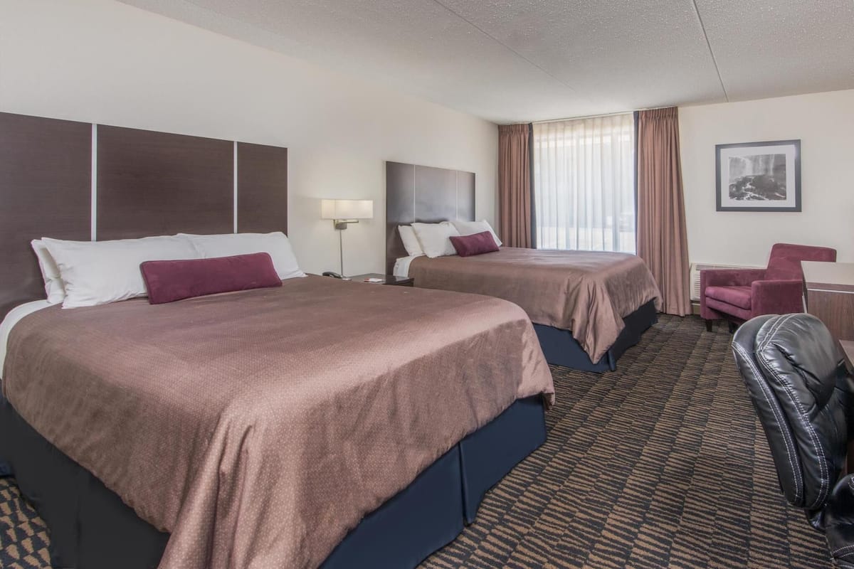 Pillow-top beds, desk, blackout curtains, iron/ironing board