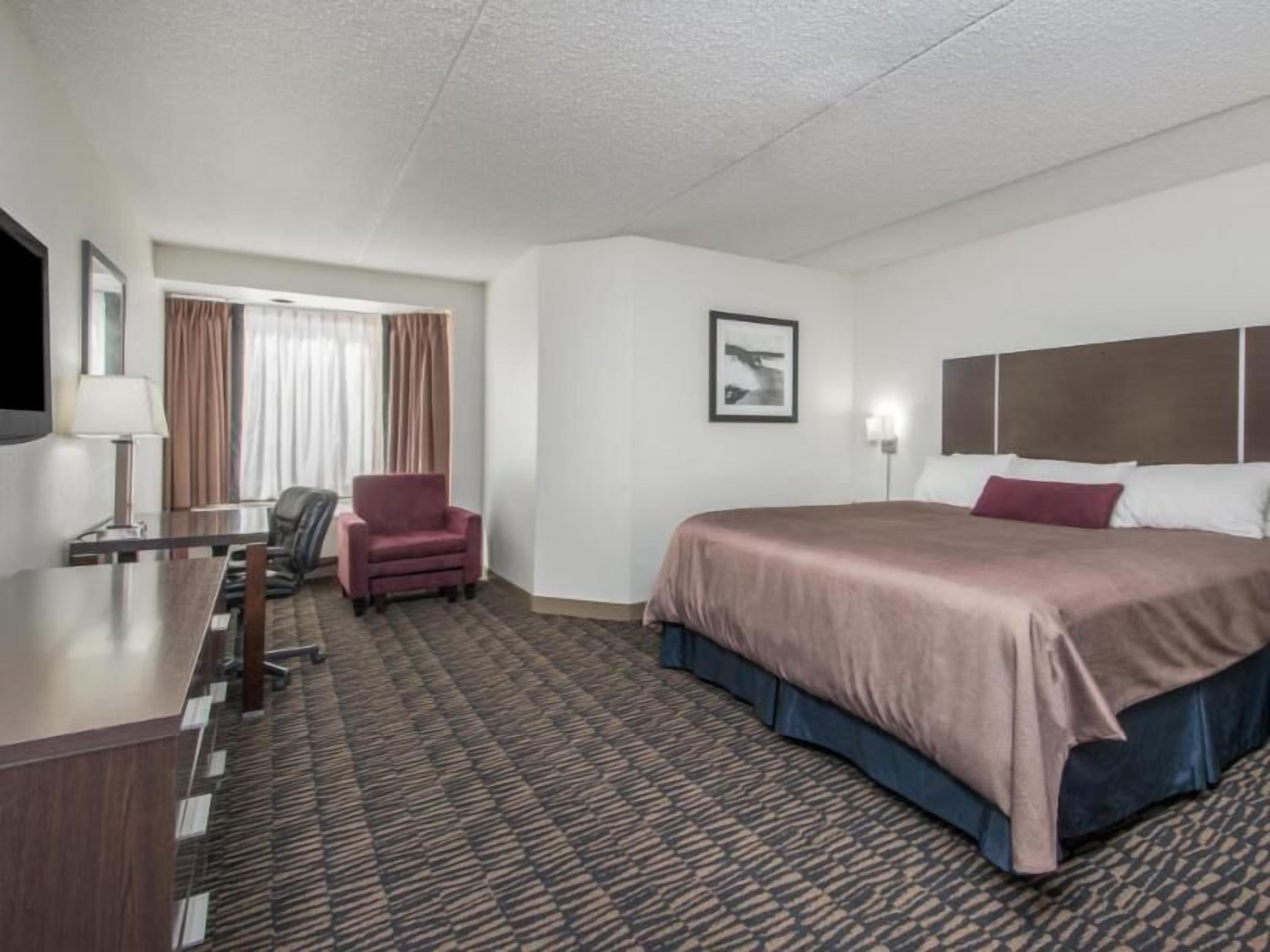 Pillowtop beds, desk, blackout drapes, iron/ironing board