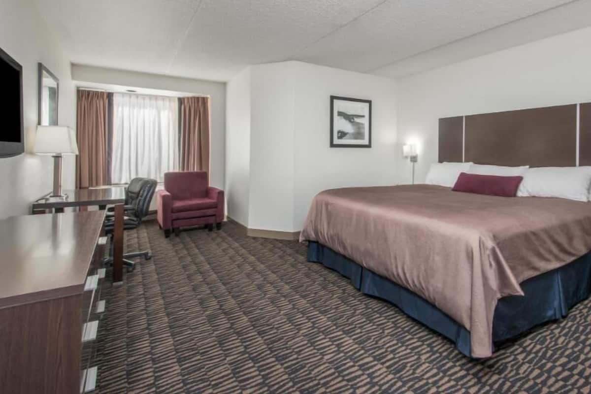 Pillow-top beds, desk, blackout curtains, iron/ironing board