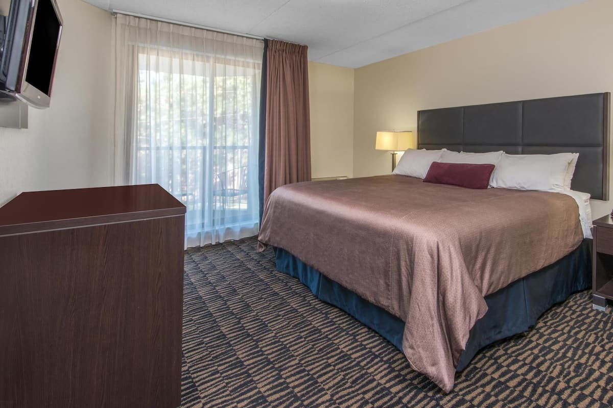 Pillow-top beds, desk, blackout curtains, iron/ironing board