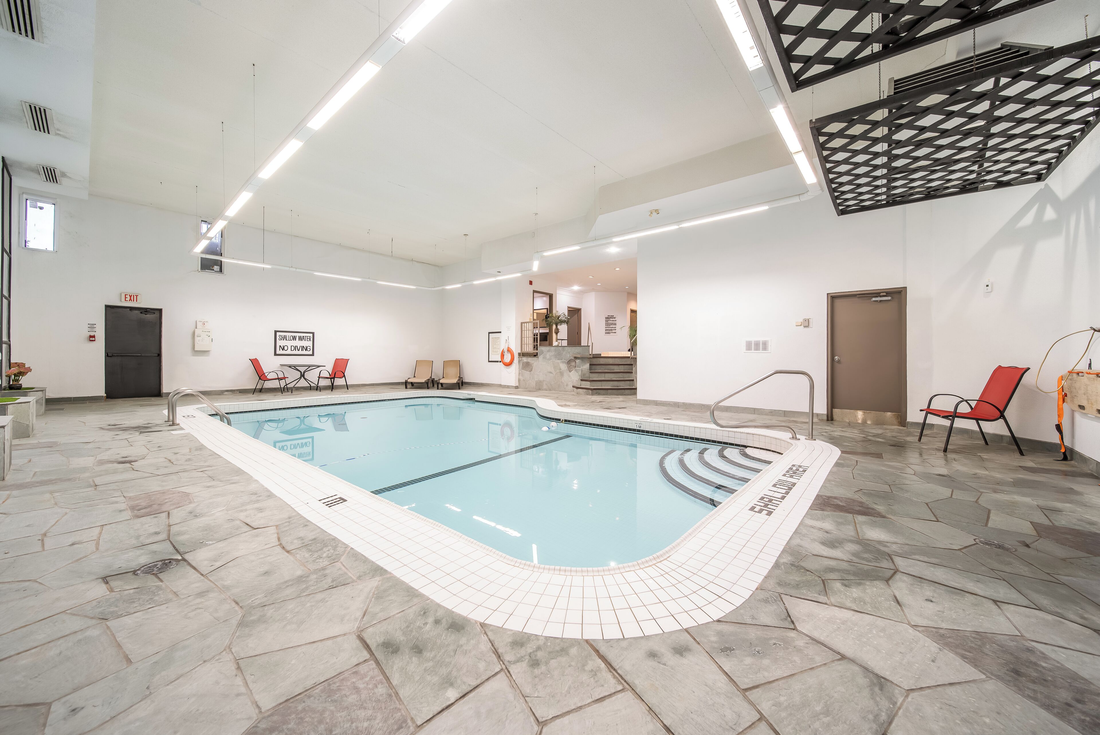 2 indoor pools, seasonal outdoor pool, pool umbrellas