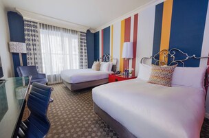 Premium bedding, down comforters, pillowtop beds, in-room safe