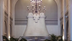 A grand lobby with a large chandelier, a fireplace, and seating areas. - The Marker Union Square San Francisco (San Francisco)