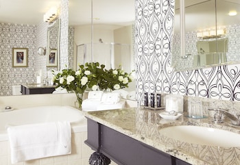 Designer toiletries, hair dryer, towels, soap at The Marker Union Square San Francisco