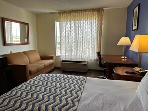 Suite, 1 King Bed, Non Smoking | In-room safe, desk, laptop workspace, blackout drapes