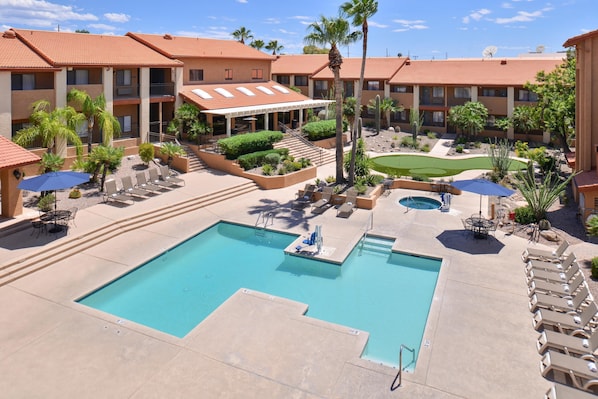 Outdoor pool, pool umbrellas, sun loungers