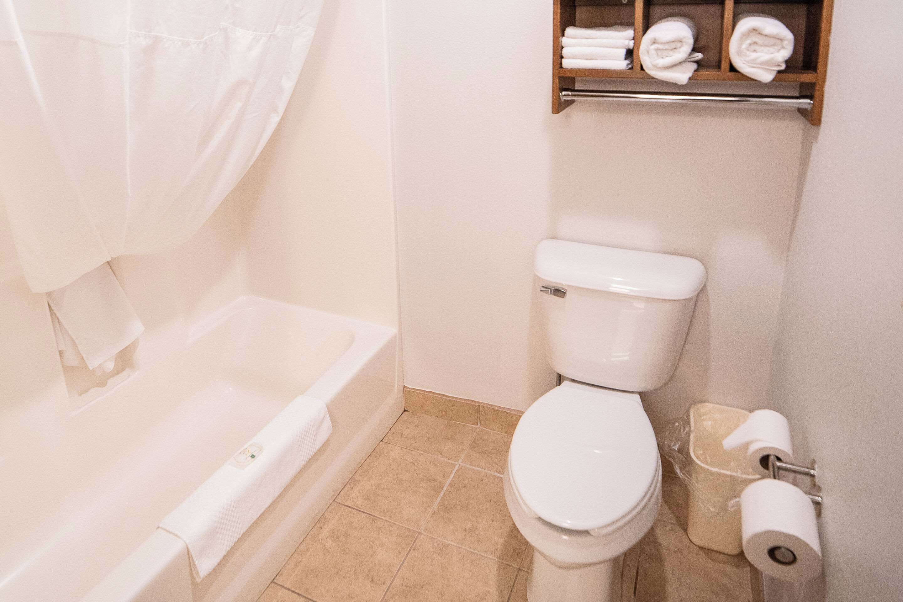 premium bedding, pillow-top beds, desk, blackout curtains