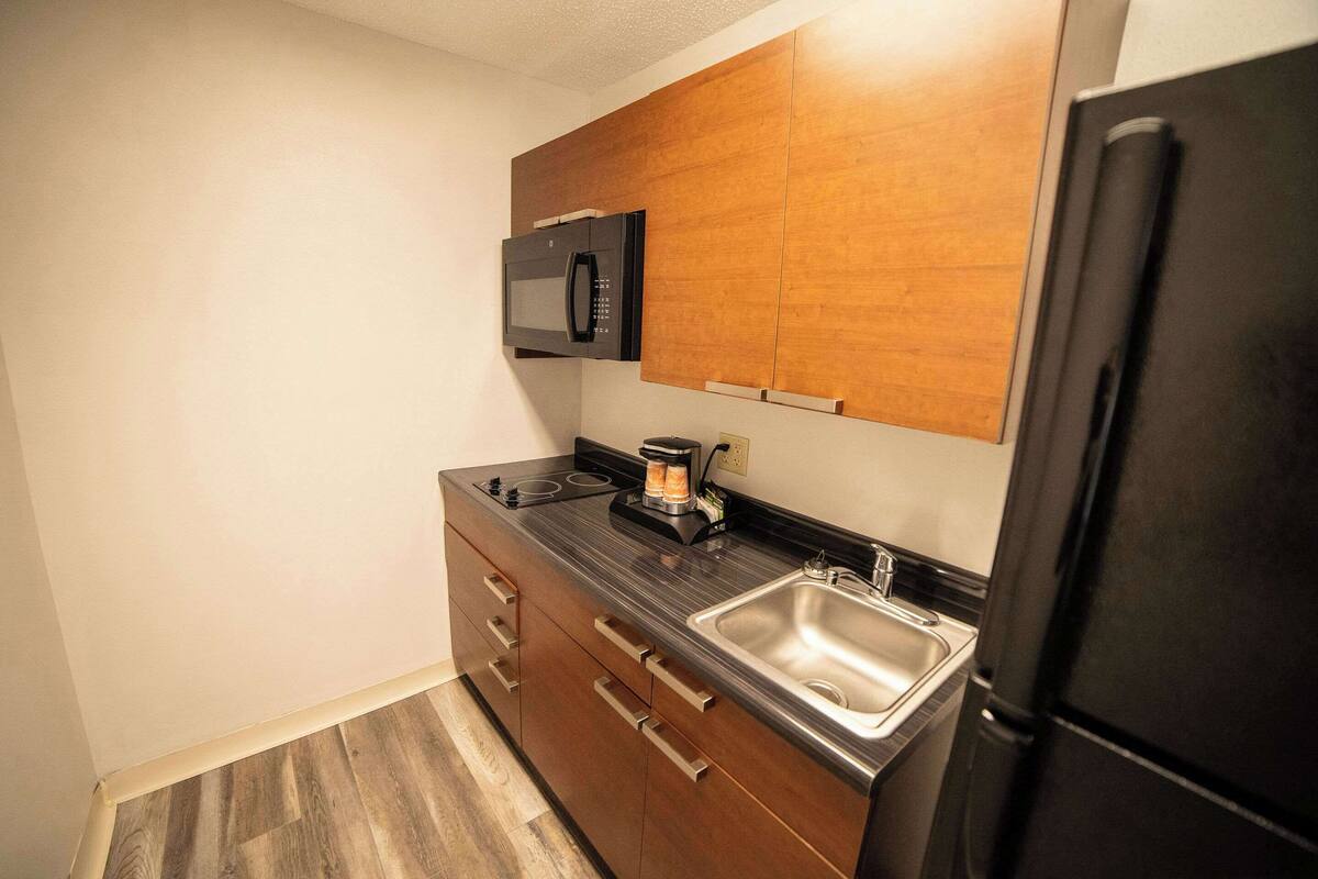 premium bedding, pillow-top beds, desk, blackout curtains