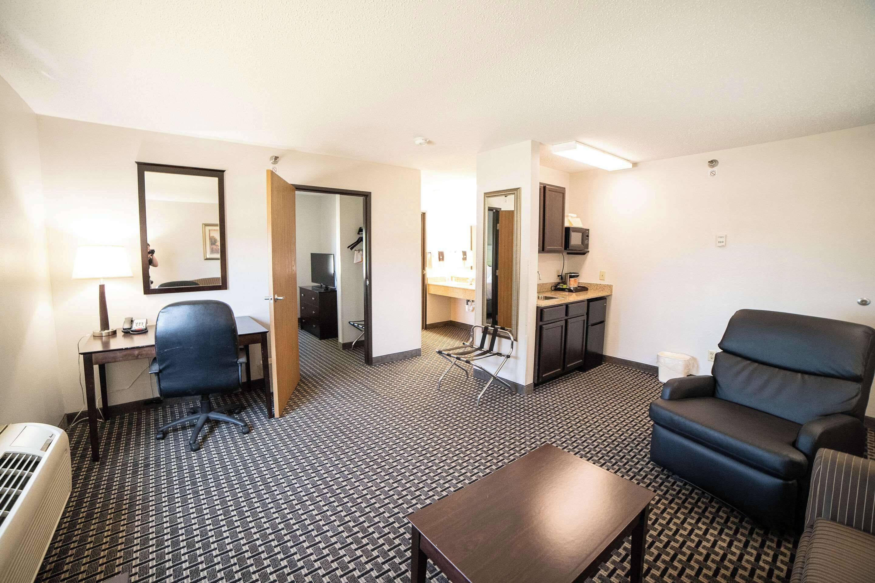 premium bedding, pillow-top beds, desk, blackout curtains