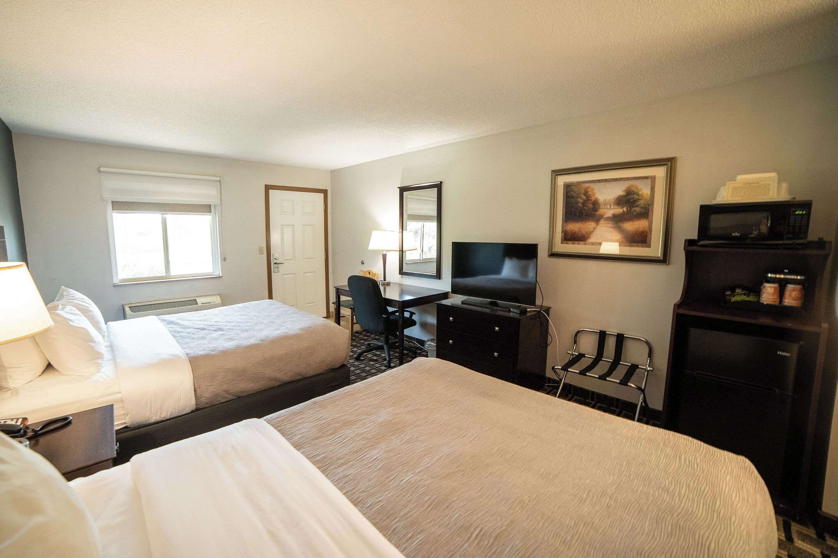 standard room, 2 queen beds, non smoking | premium bedding, pillow-top beds, desk, blackout curtains