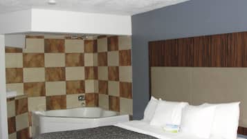 Deluxe Studio Suite, 1 King Bed, Non Smoking | Desk, iron/ironing board, free cribs/infant beds, rollaway beds