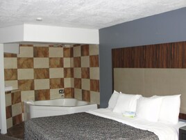 Deluxe Studio Suite, 1 King Bed, Non Smoking | Desk, iron/ironing board, free cribs/infant beds, rollaway beds