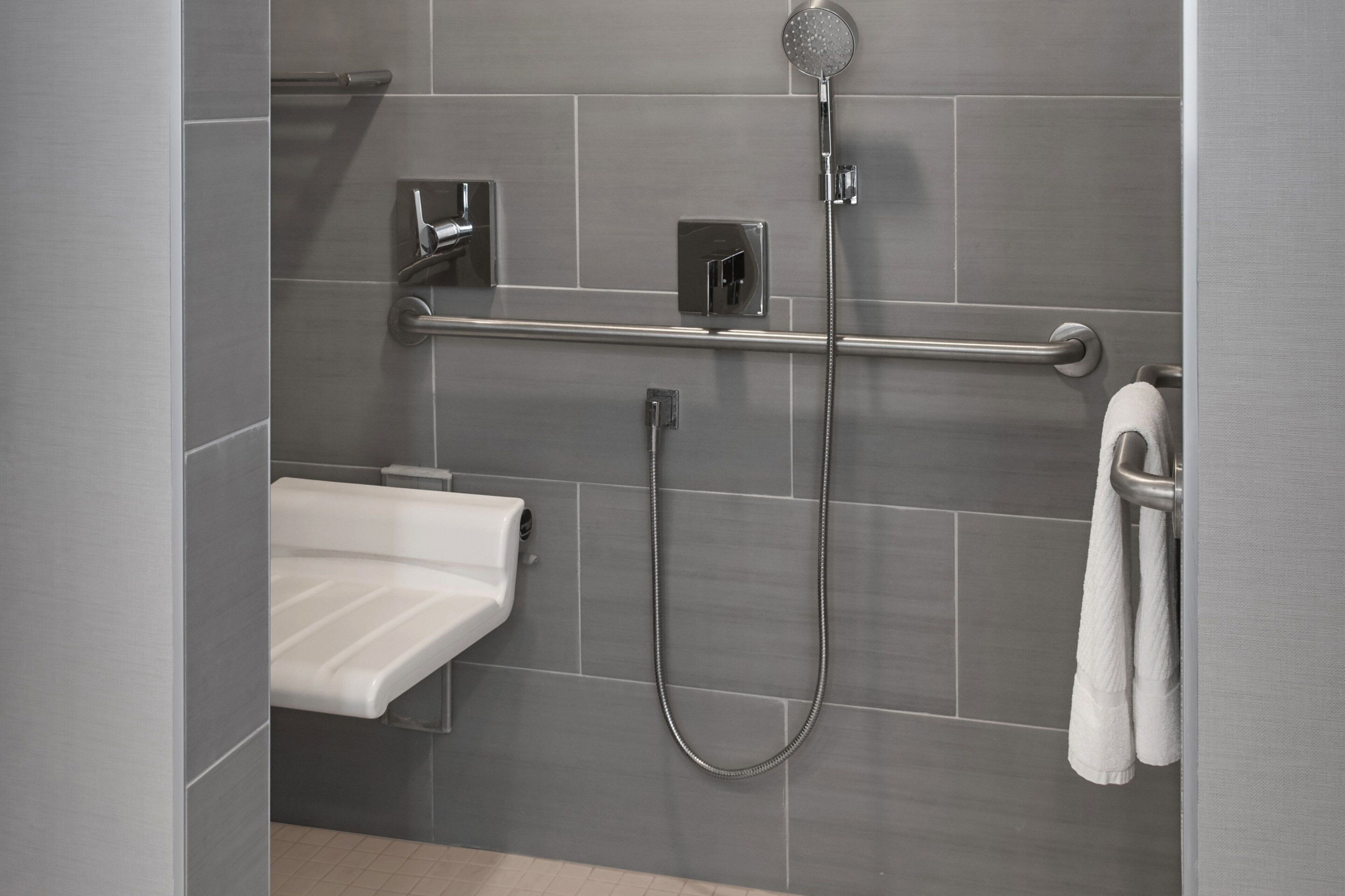 combined shower/bathtub, free toiletries, hair dryer, towels