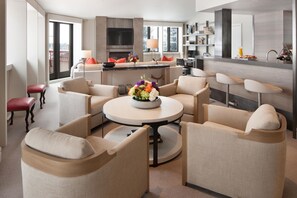 Suite (The Little Nell) | Living room | 48-inch LED TV with cable channels, TV, fireplace