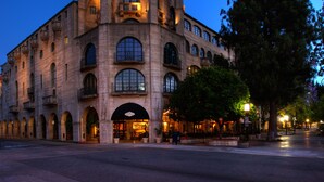 A historic building with arched windows and a central entrance. - The Mission Inn Hotel & Spa (Riverside)