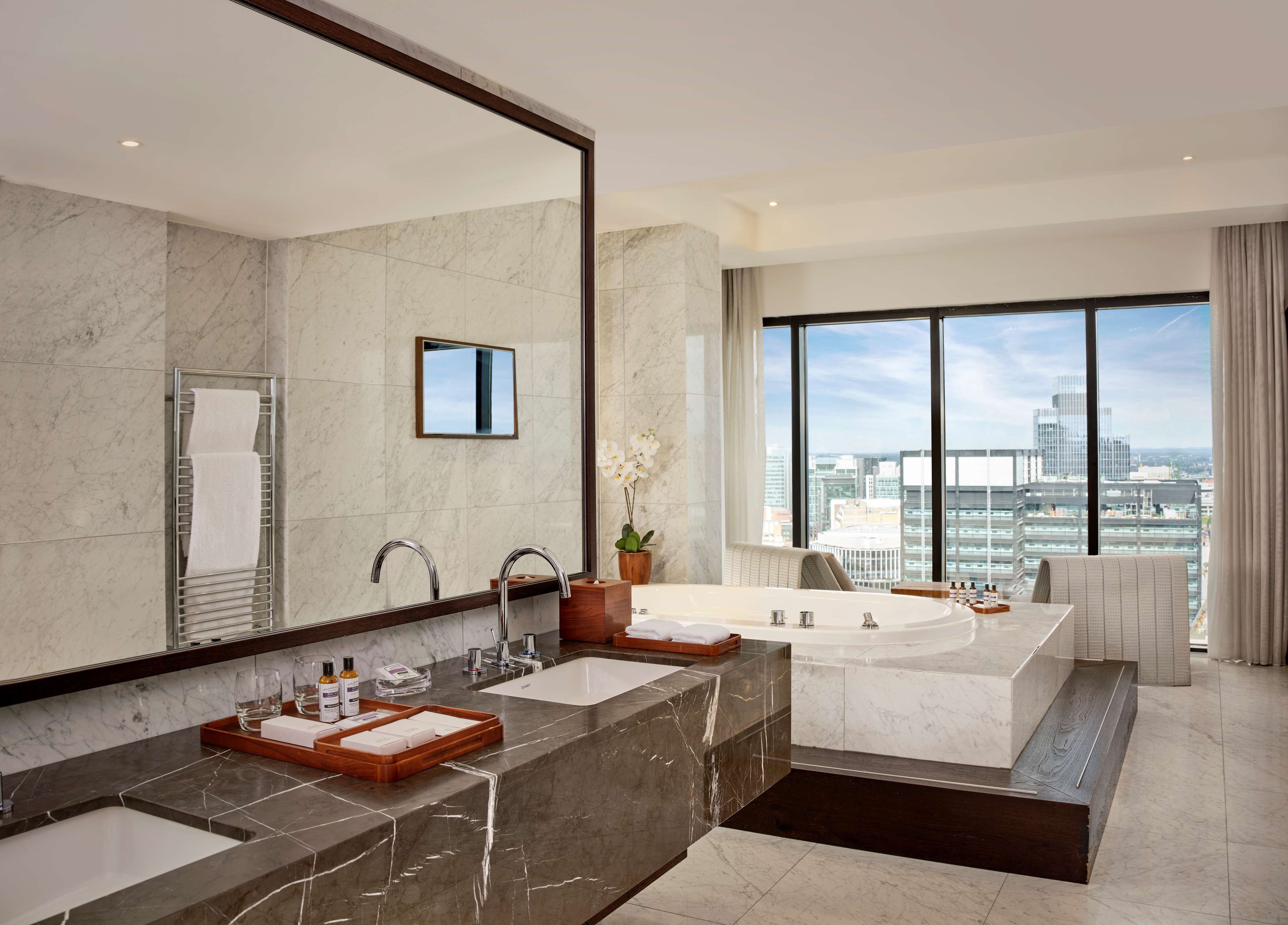 combined shower/bathtub, eco-friendly toiletries, hair dryer, bathrobes