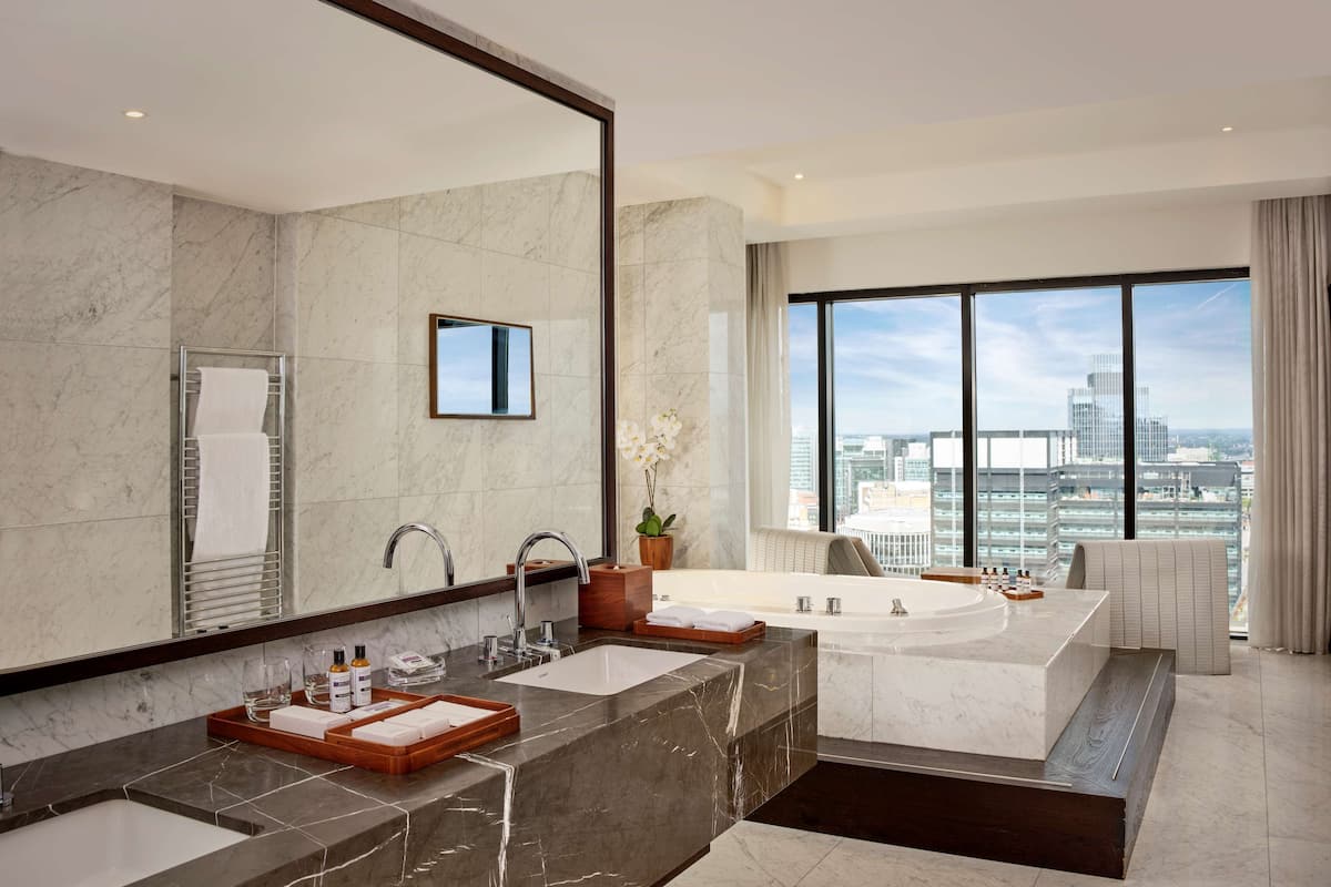 combined shower/bathtub, eco-friendly toiletries, hair dryer, bathrobes