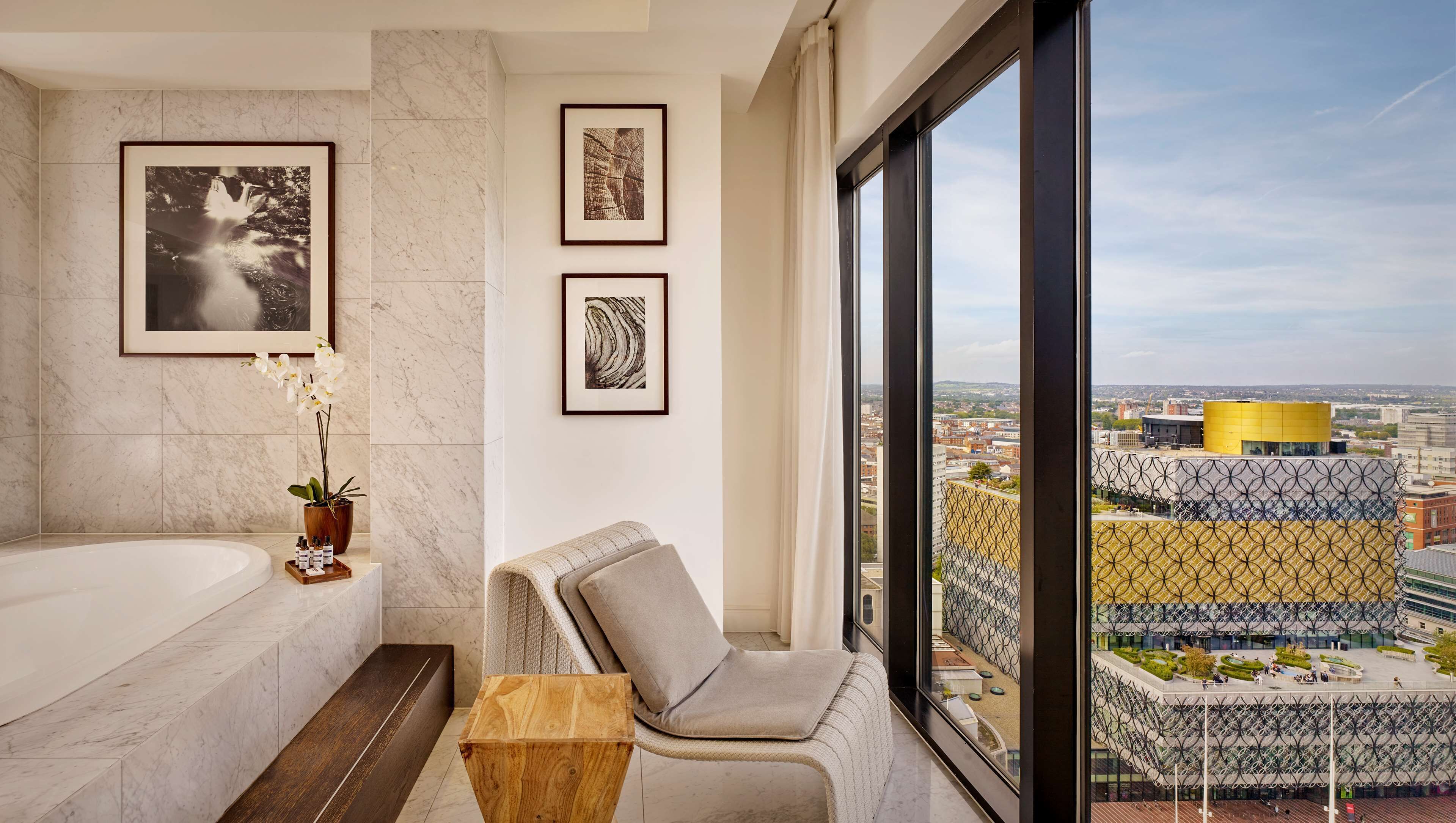 combined shower/bathtub, eco-friendly toiletries, hair dryer, bathrobes