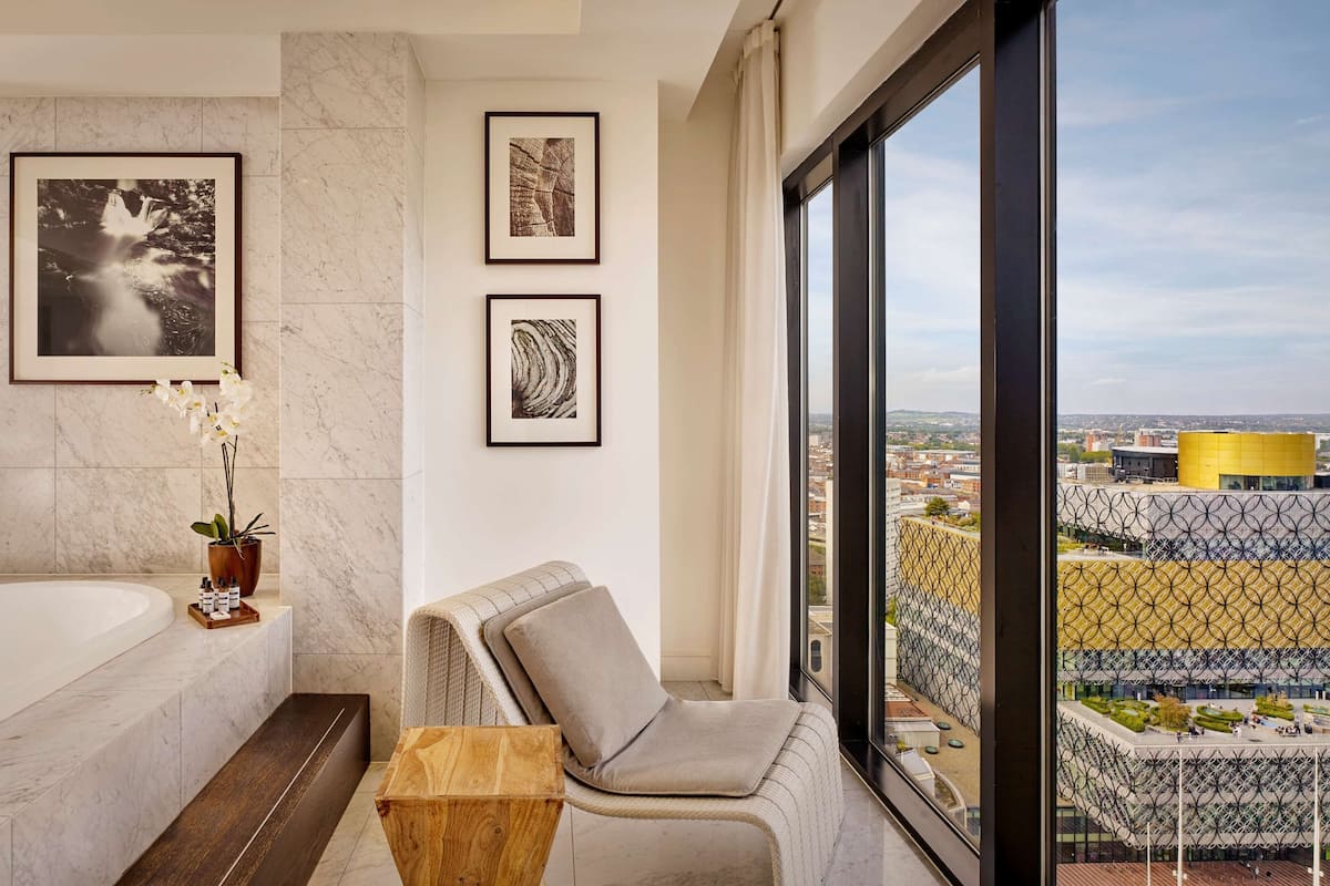 combined shower/bathtub, eco-friendly toiletries, hair dryer, bathrobes