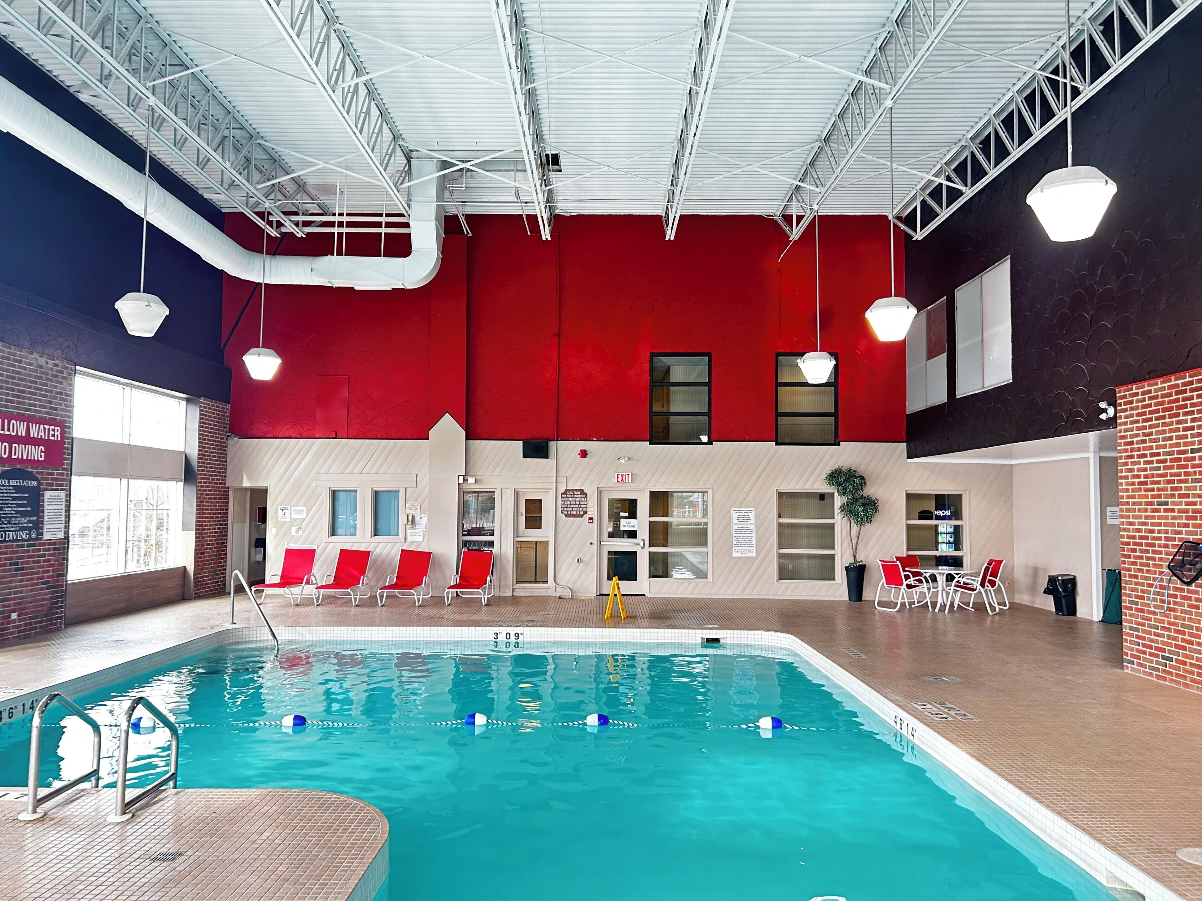 Indoor pool, open 7 AM to 11 PM, sun loungers