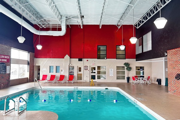 Indoor pool, open 7 AM to 11 PM, sun loungers
