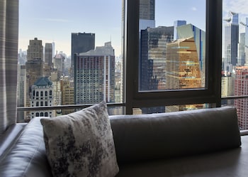 Down comforters, in-room safe, desk, laptop workspace at New York Marriott Marquis