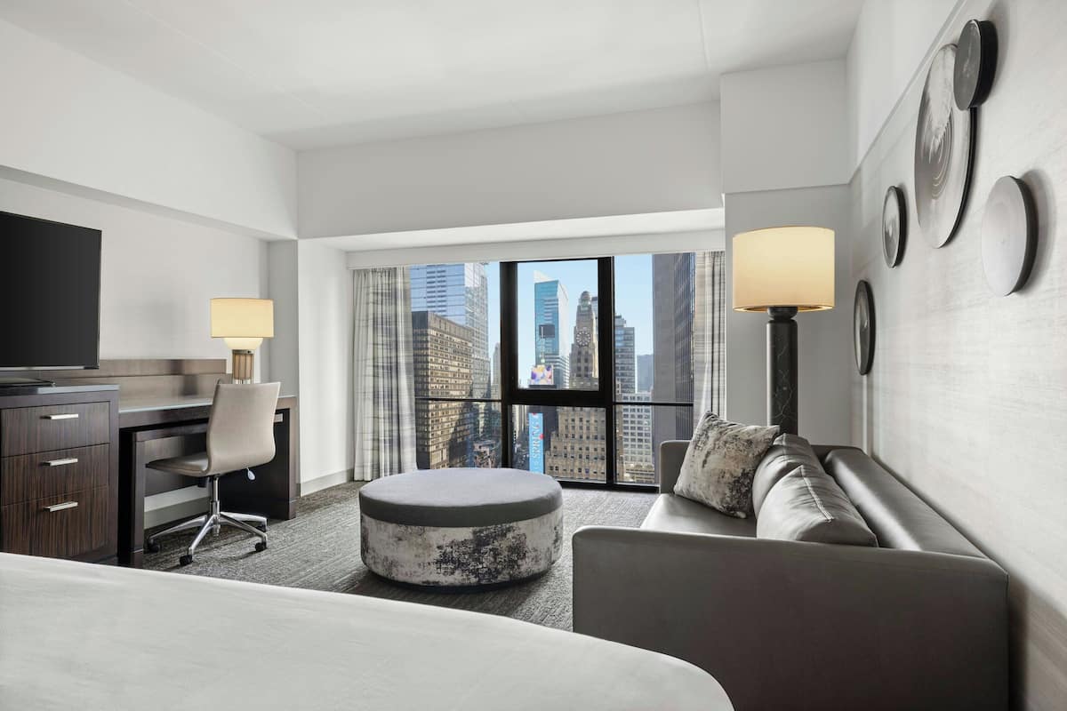 Room, 1 King Bed (Times Square View Room) | 1 bedroom, down comforters, in-room safe, desk