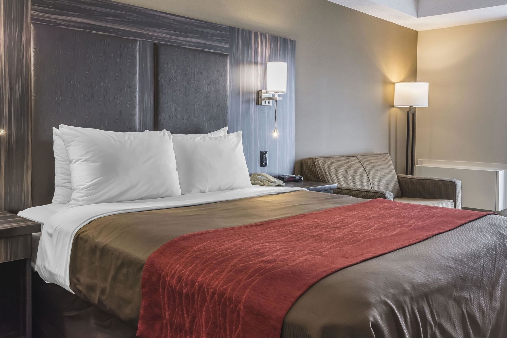 Premium bedding, blackout curtains, iron/ironing board