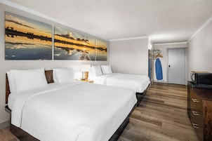 Quarto standard, 2 camas Queen | Cortinas blackout, ferros/tábuas de passar roupa, berços grátis