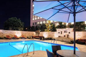 Outdoor pool, open 8:00 AM to 8:00 PM, pool umbrellas, pool loungers