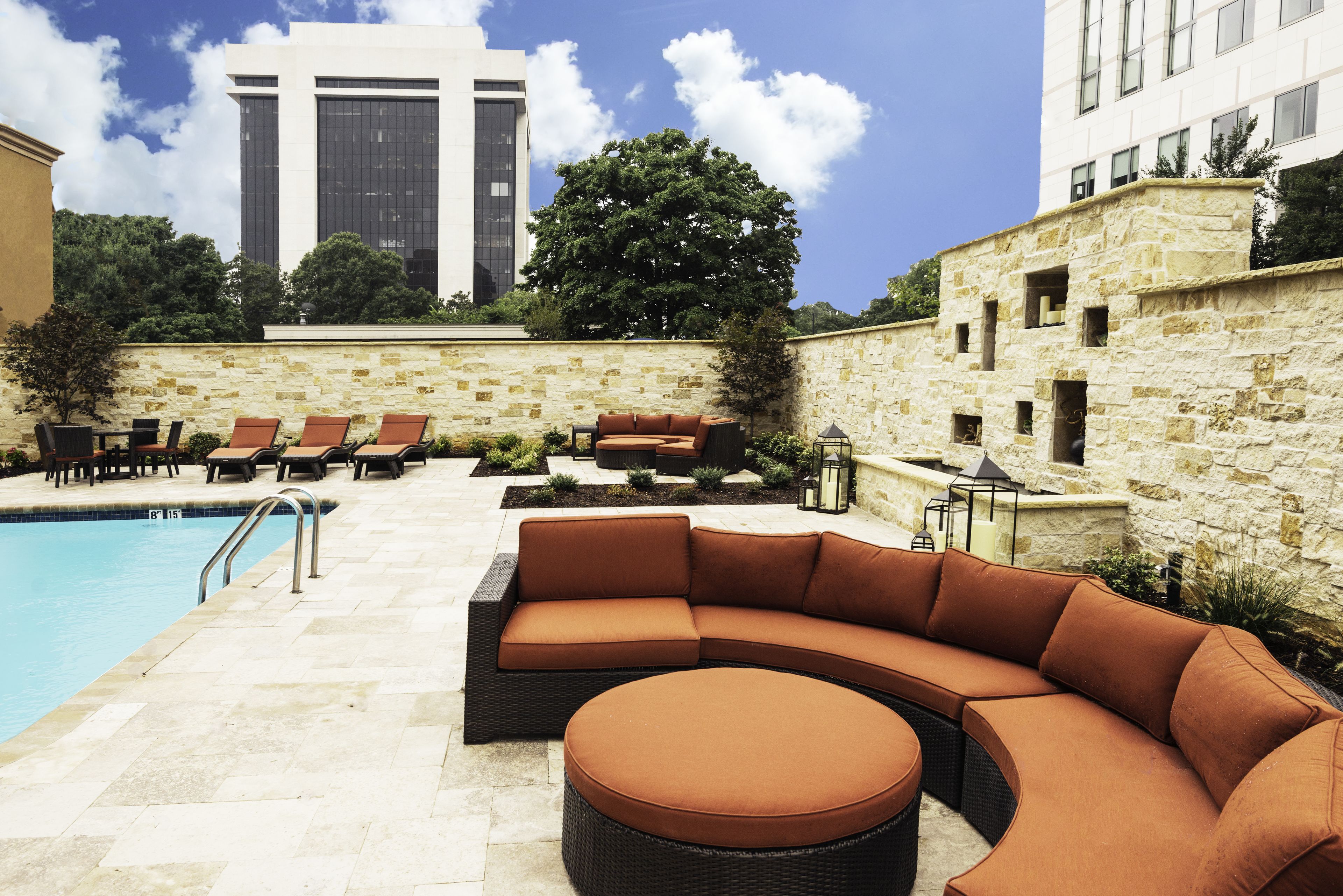 Outdoor pool, open 8:00 AM to 8:00 PM, pool umbrellas, pool loungers