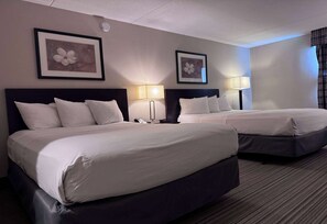 Pillowtop beds, desk, blackout drapes, iron/ironing board
