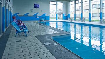 Indoor pool, open 9:00 AM to 10:00 PM, sun loungers