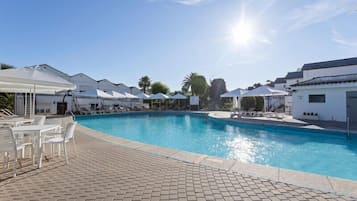 Seasonal outdoor pool, pool umbrellas, sun loungers